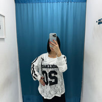 Maglia a maniche lunghe con ricami 9331