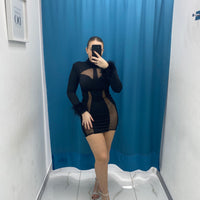 Vestito con trasparenza e piume 31215
