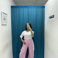 Pantalone con bottoni laterali 96536