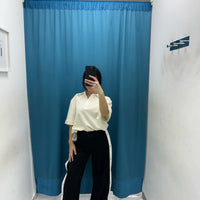 Pantalone con bottoni laterali 96536