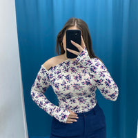 Maglia laser con spalla scoperta