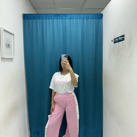 Pantalone con bottoni laterali 96536