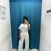 Pantalone con bottoni laterali 96536