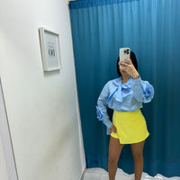 Gonna a pantaloncino giallo 246011