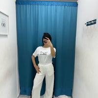 Pantalone con bottoni laterali 96536
