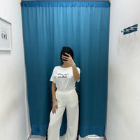 Pantalone con bottoni laterali 96536