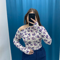 Maglia laser con spalla scoperta