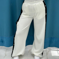 Pantalone con bottoni laterali 96536
