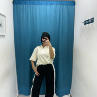 Pantalone con bottoni laterali 96536