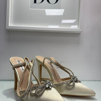 Décolleté con fiocco in strass panna