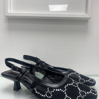 Décolleté slingback chic