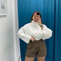 Shorts a quadri marrone