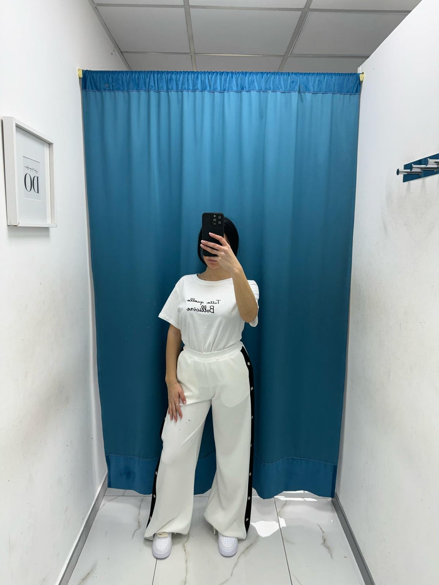 Pantalone con bottoni laterali 96536