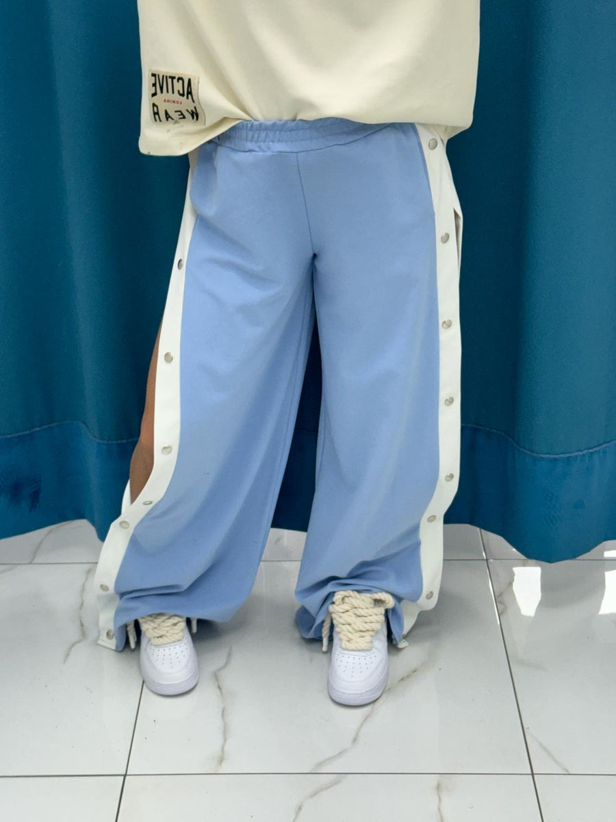 Pantalone con bottoni laterali 96536