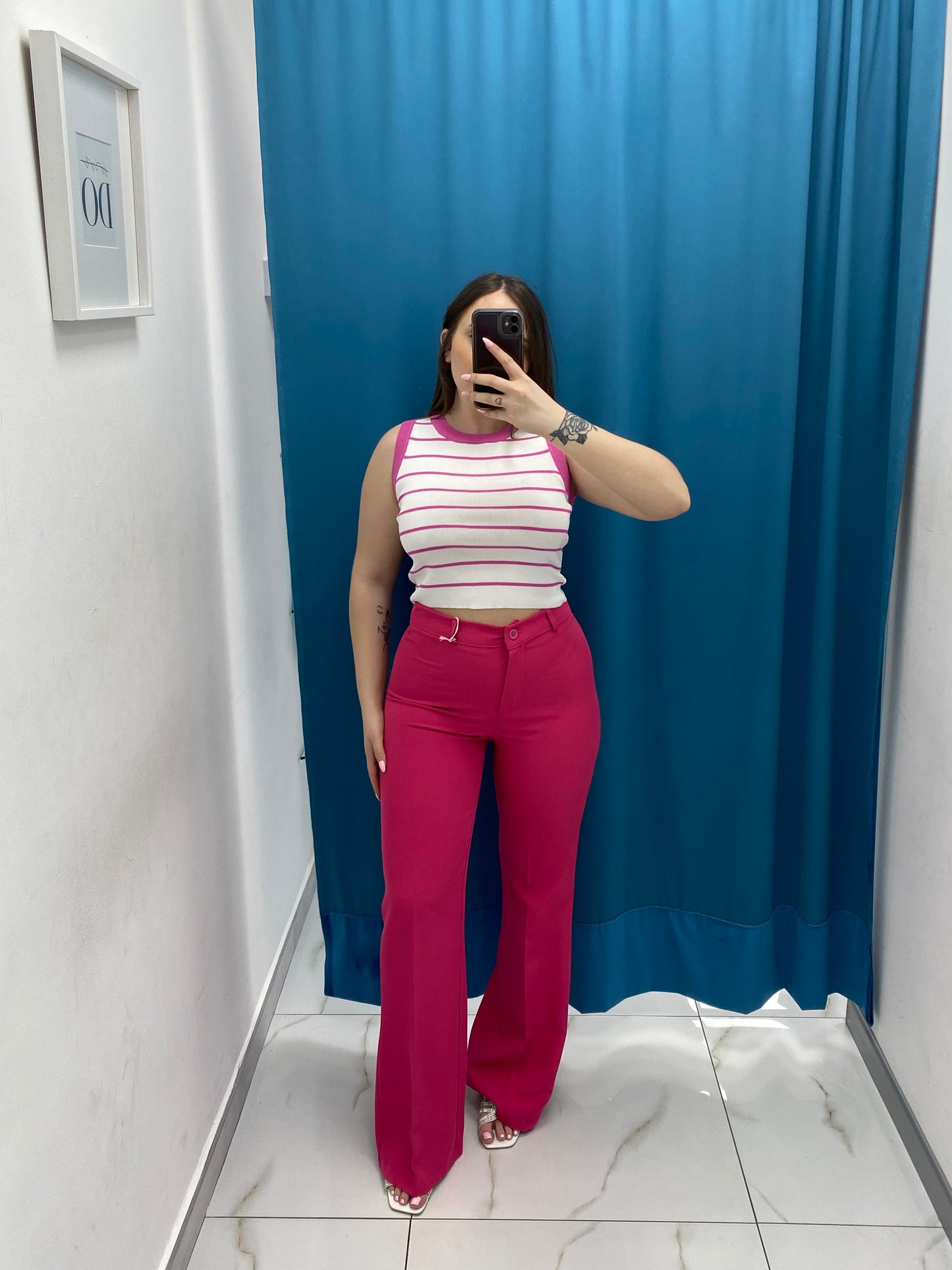 Pantalone a zampa fucsia