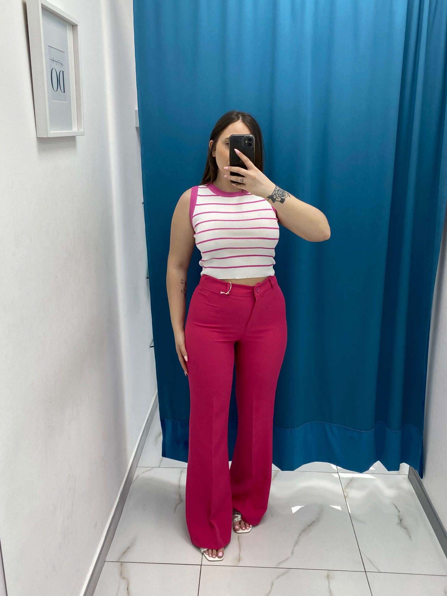 Pantalone a zampa fucsia