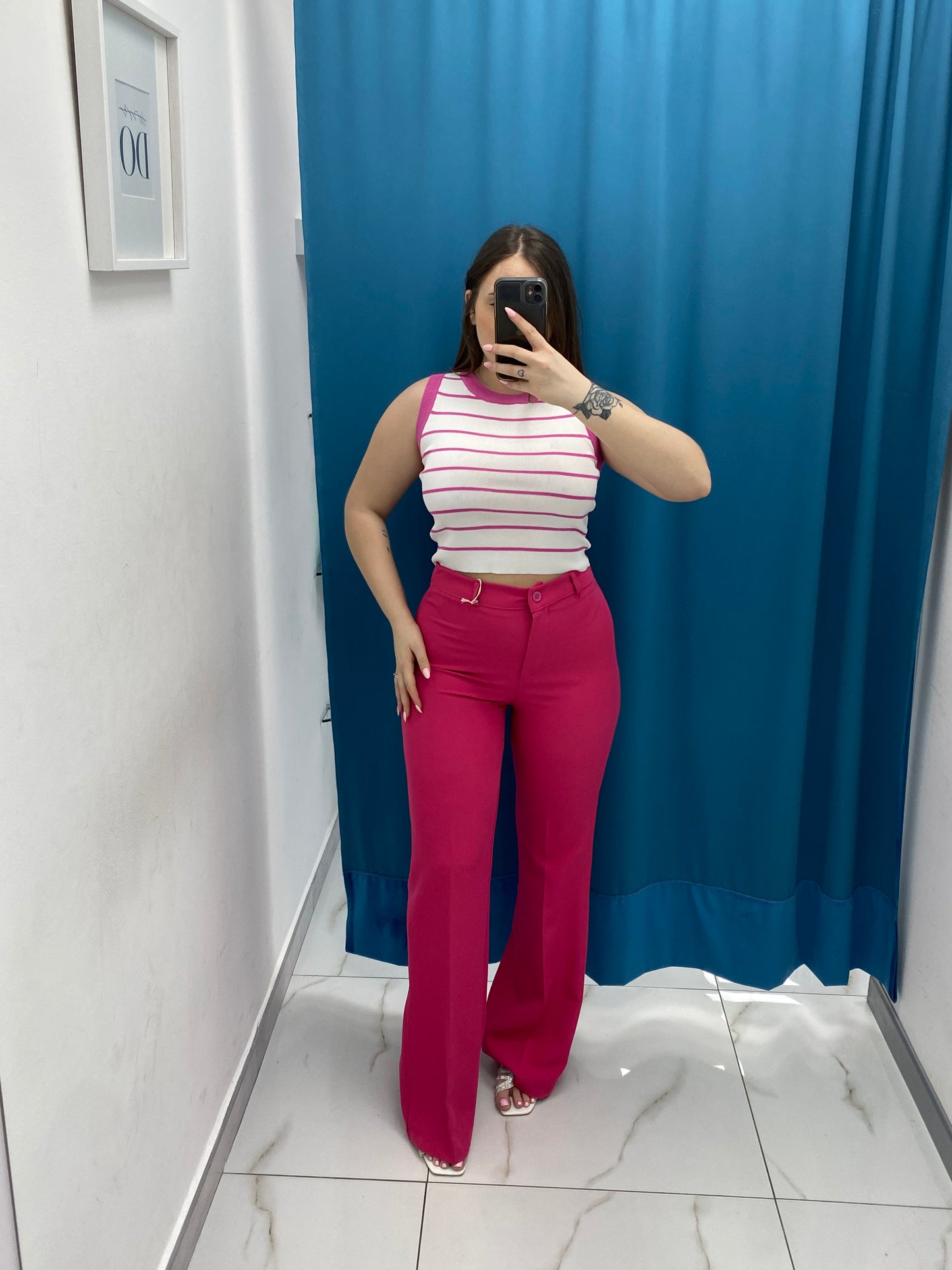 Pantalone a zampa fucsia