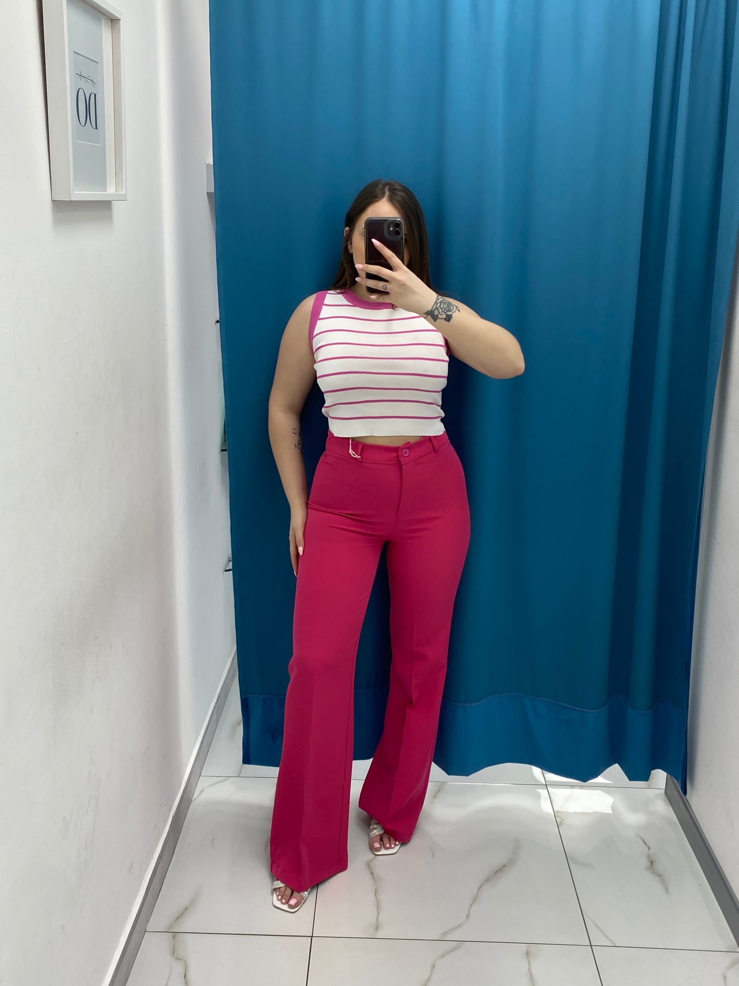 Pantalone a zampa fucsia